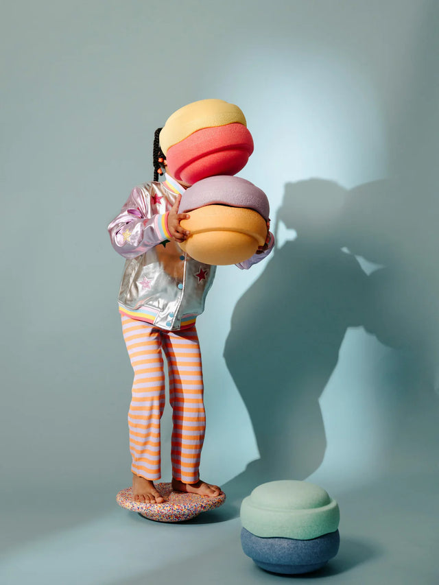 ORIGINAL PASTEL COLOURS LAYING BRICKS WITH BALANCING STONE
