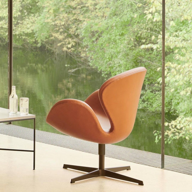 SWAN LEATHER CHAIR IN WALNUT