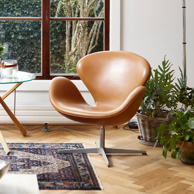 SWAN LEATHER CHAIR IN WALNUT